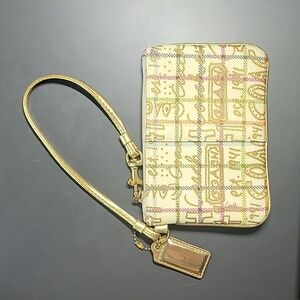 Coach Poppy Graffiti Wristlet